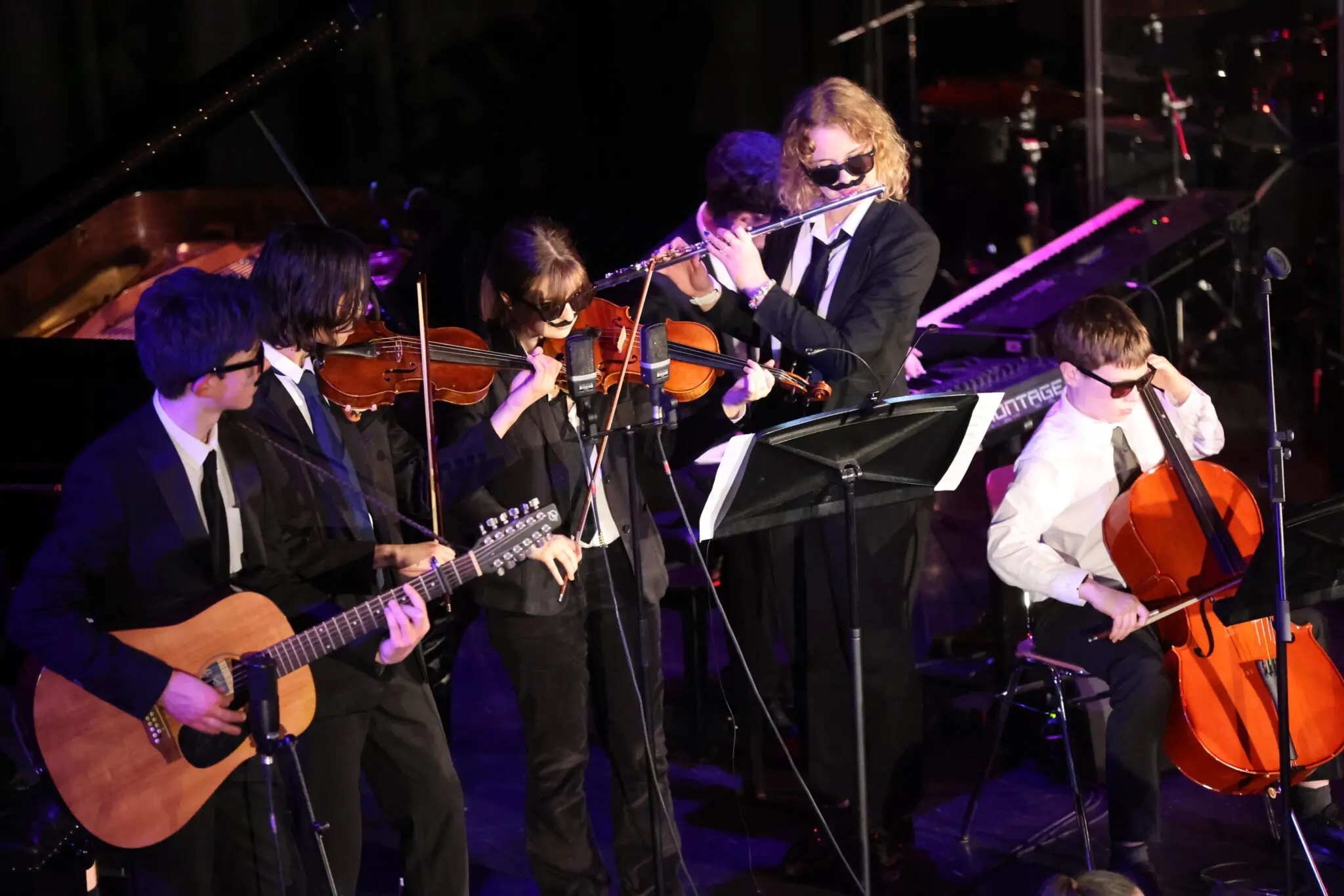music students in suits during concert