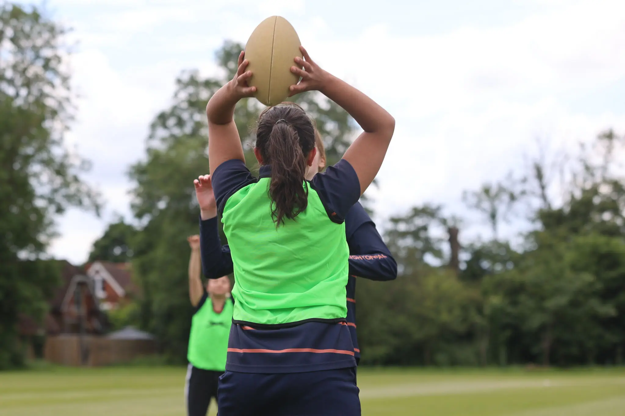 school girls in a rugby match