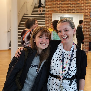 teacher and student on GSCE results day