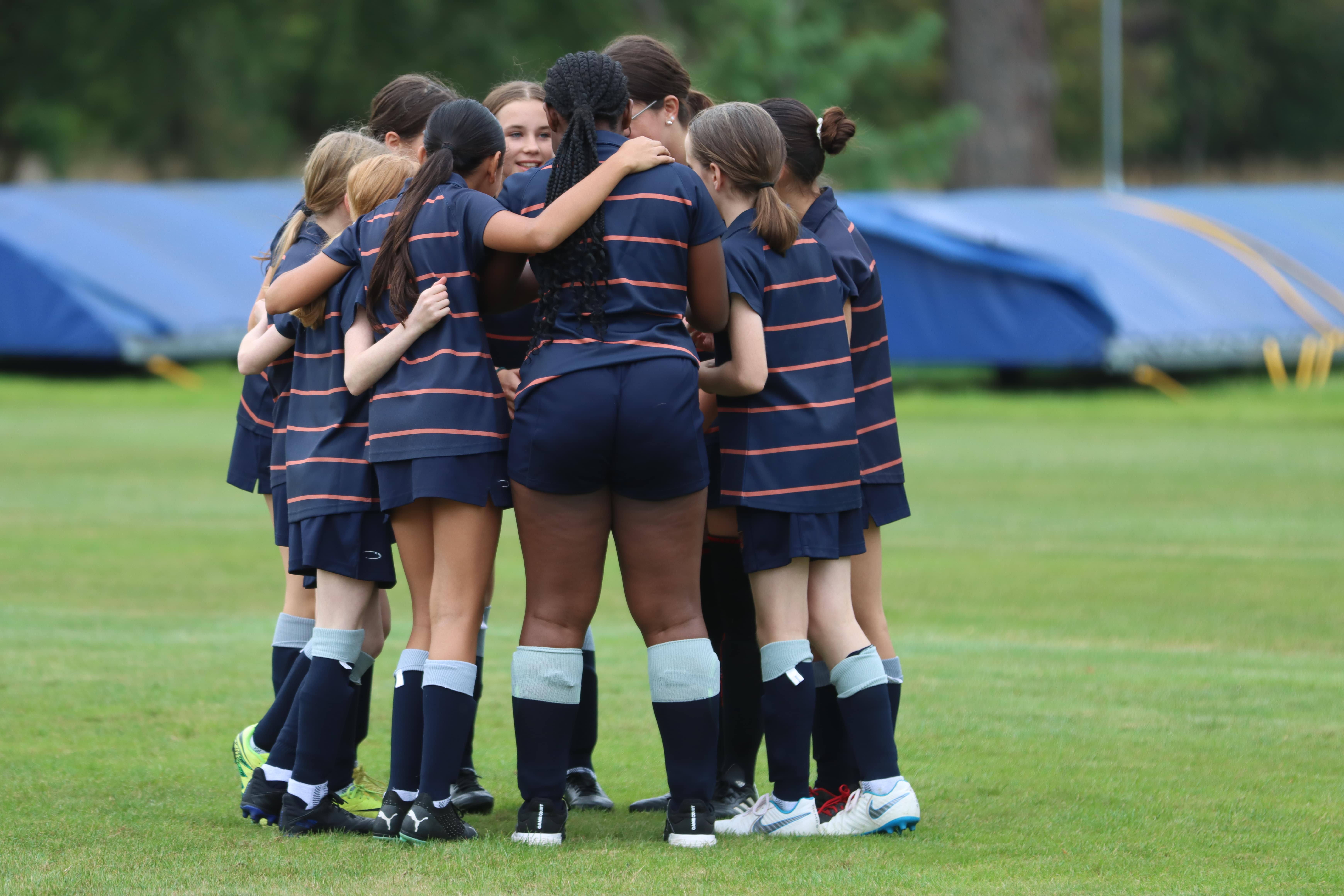 Her Game Too pupils on pitch 